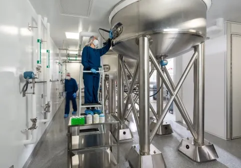 Scientist checking a container